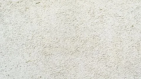 Surface of the wall, covered with textured plaster with small bumps and prick Stock Photos