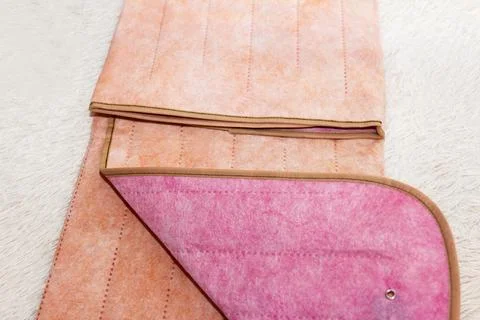 Surface of a warm new two-sided electro sheet, laid out on bed, looks from .. Foto stock