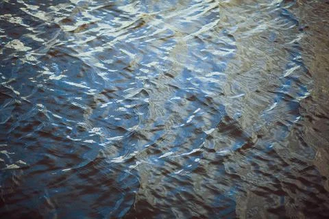 The surface of the water and the reflected light of the city Stock Photos