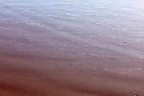 The surface of the water on the beach Stock Photos