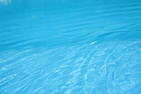 The surface of the water in the blue pool. Stock Photos