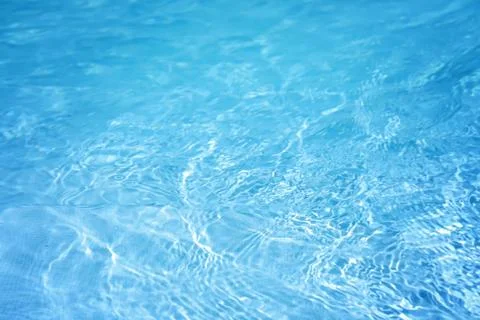 The surface of the water in the blue pool. Stock Photos