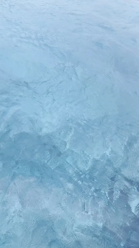 The Surface of Water is Crystal Clear, Featuring Gentle and Calm Waves Stock Footage 285160981