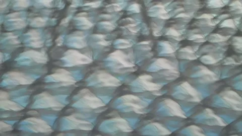Surface of water reflects sunlight in clear patterns Stock Footage 327428420