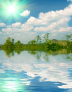 Surface water ripple and reflection of soft sky and clouds background Stock Photos