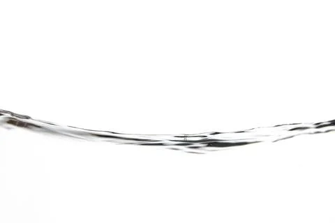The surface of the water splashing on a white background Stock Photos