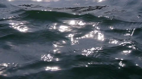 The surface of the water in the sun and wind Stock Footage 143395174