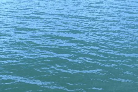 Surface of the water. Waves on the sea. Stock Photos