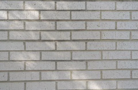 Surface of white brickwall. Textured grey brick backdrop. Wall texture Stock Photos