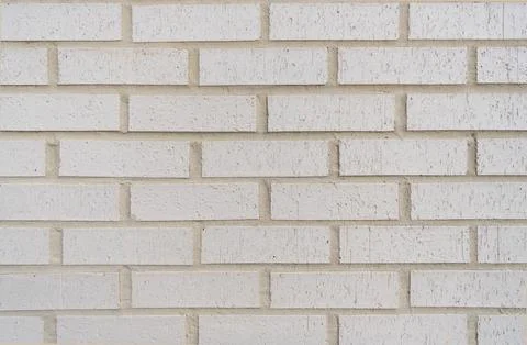 Surface of white brickwall. Textured grey brick backdrop. Wall texture Stock Photos