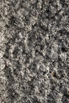 Surface of white stone with medium corrugated black veins Foto stock