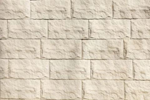 Surface with white tiles with a stone texture for the exterior Stock Photos