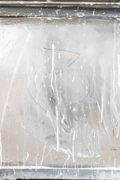 Surface of window glass is smeared with lime Stock Photos