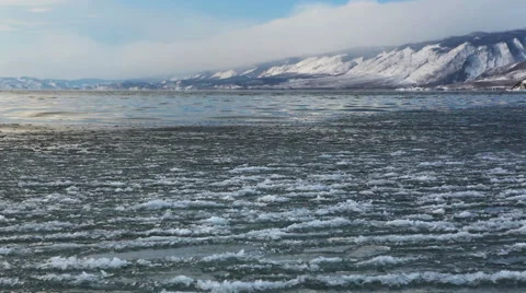 Surface of winter Baikal, water and ice in it Stock Footage 61362819