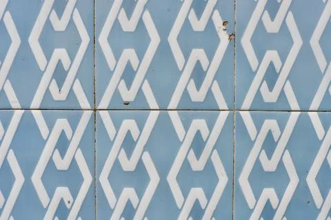 Surface of worn retro tiled background with geometrical ornate of white and.. Stock Photos