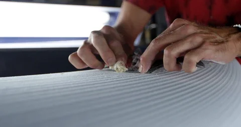 Surfboard being shaped Stock Footage 127125544