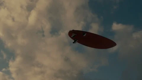 Surfboard flying in the air Stock Footage 307313727