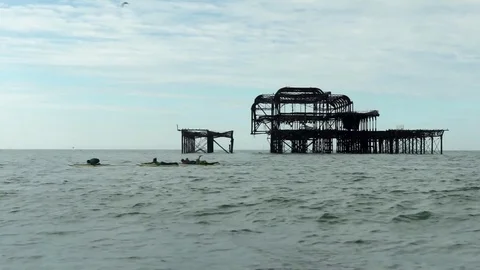 Surfboard lessons at Brighton Old Pier Stock-Footage 77481122