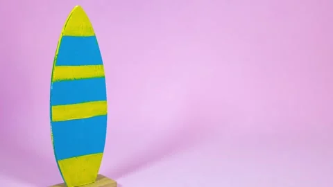Surfboard movement on pink background Stock Footage 287702366