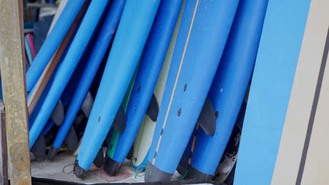 Surfboard pattern in azure blue shades along the wall. Slow motion. 4K Video stock 246944577