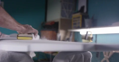 Surfboard shaper Man making a surfboard in a workshop Stock Footage 107640107