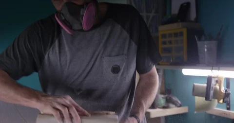 Surfboard shaper Man making a surfboard in a workshop Stock Footage 107640445