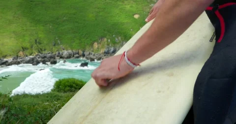 Surfboard Waxing by the Sea: Видео 343669226