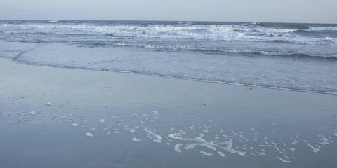 Surfboarder walking towards the beach Stock Footage 103492166