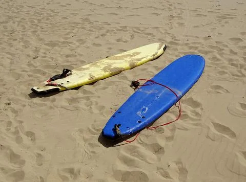 Surfboards On Beach Sand Stock Photos