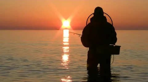 Surfcasting at Beautiful Sunset - Baltic Sea, Northern Germany Stockbeeldmateriaal 12381280
