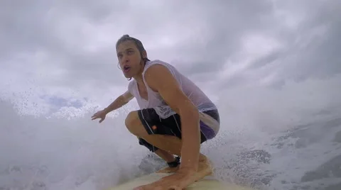 Surfer accelerates and gets on board Stock Footage 55886695