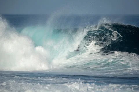 Surfer in action on a big wave Stock Photos
