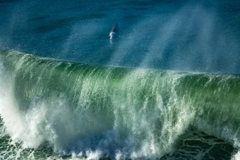 The surfer and the wave Stock Photos