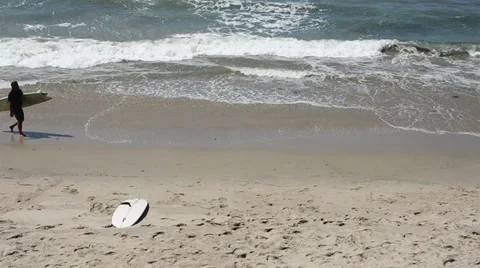 Surfer On Beach Stock Footage 27730162