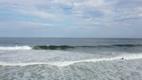 Surfer at the beach Stock Footage 146571649