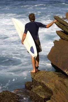 Surfer at the Beach Stock Photos