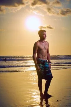 Surfer on beach Stock Photos