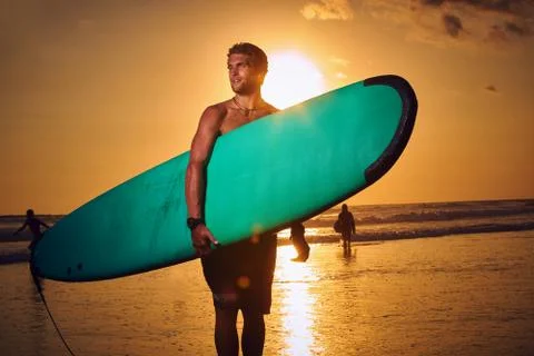 Surfer on beach Stock Photos