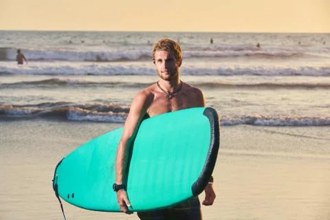 Surfer on beach Stock Photos