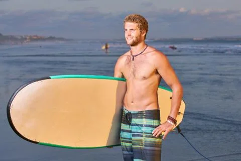 Surfer on beach Stock Photos