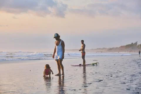 Surfer on beach Stock Photos