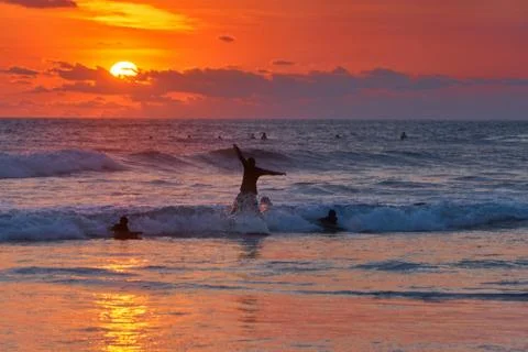 Surfer on beach Stock Photos