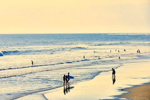 Surfer on beach Stock Photos