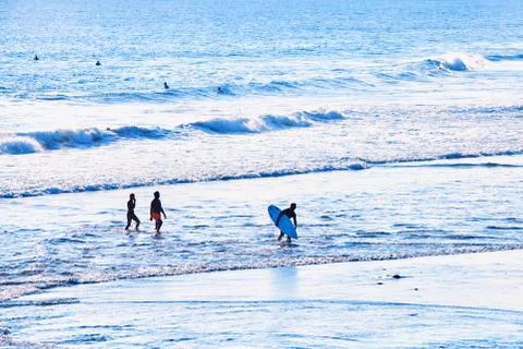 Surfer on beach Stock Photos