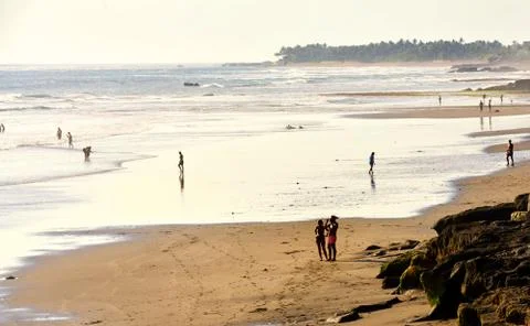 Surfer on beach Stock Photos