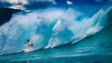 Surfer on big wave Stock Photos