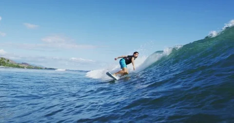 Surfer on Blue Ocean Wave Stock Footage 76283711