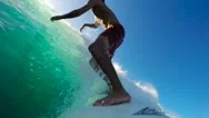 Surfer On Blue Ocean Wave Surfing Down The Line. Gopro Pov Selfie Stock Footage