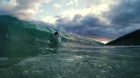 Surfer on Blue Ocean Wave Wipe Out. Stock Footage 52045359