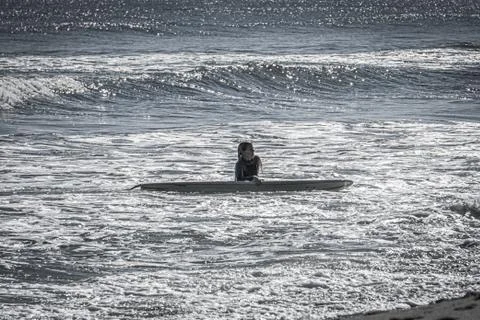 Surfer off the board Foto stock